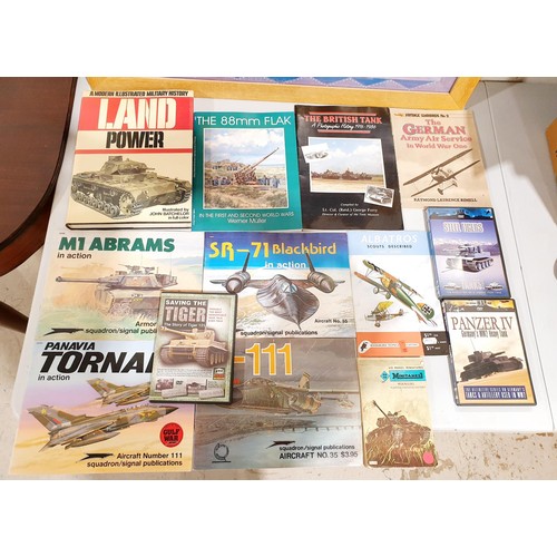 38 - A selection of books and DVDs relating to World War II era tanks and aircraft. UK shipping £14.