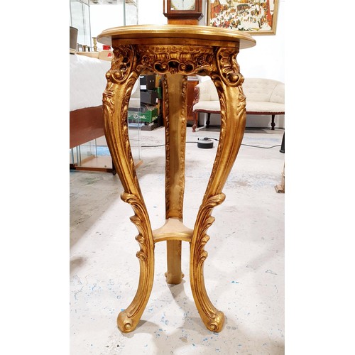 113 - A gilt and carved wooden tripod plant stand, height 75.5cm. No shipping. Arrange collection or your ... 