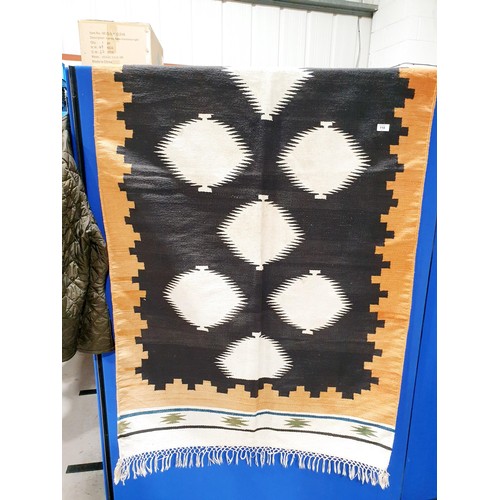 118 - A woollen rug, 270x110cm. No shipping. Arrange collection or your own packer and shipper, please. El... 