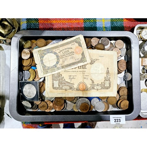 223 - A selection of British and foreign coins and two bank notes. UK shipping £14.