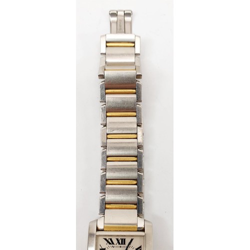 22 - A gentleman's Cartier Tank Francaise quartz wrist watch, mid size, model 2465, the strap and case of... 