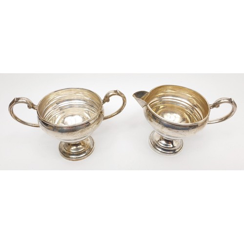 33 - A sterling silver weighted sugar basin and milk jug, height 9.5cm, gross weight 190g. UK shipping £1... 