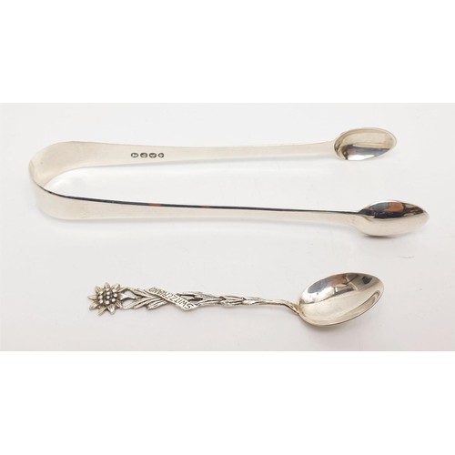 34 - A pair of William IV hallmarked silver sugar tongs, London 1831, weight 30g together with an 800 sil... 