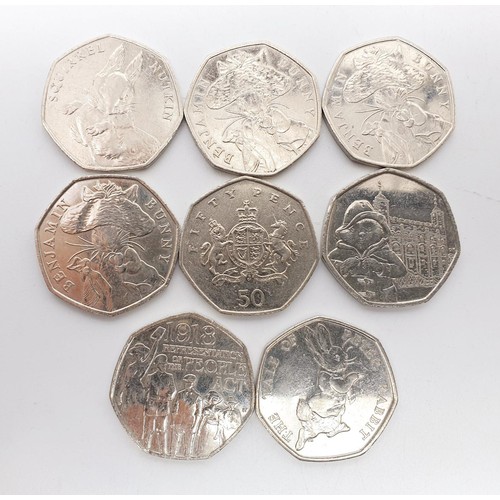 36 - Eight collectable 50p pieces including a Beatrix Potter 2016 Squirrel Nutkin. UK shipping £14.