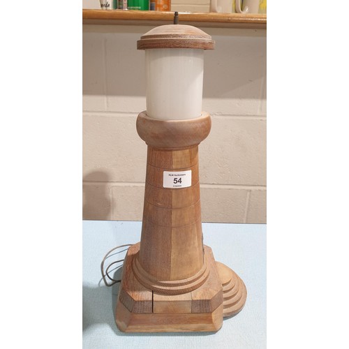 54 - A wooden lamp in the form of a lighthouse A/F, height 40cm together with a paper parasol. No shippin... 