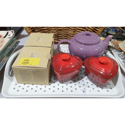 61 - A Le Creuset teapot and two Le Creuset heart shape ramekins. No shipping. Arrange collection or your... 