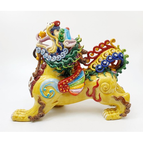 65 - A ceramic Chinese Dog of Fo/Foo, A/F, signed, length 32cm. No shipping. Arrange collection or your o... 