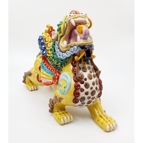 65 - A ceramic Chinese Dog of Fo/Foo, A/F, signed, length 32cm. No shipping. Arrange collection or your o... 