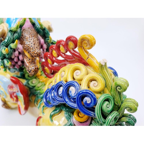 65 - A ceramic Chinese Dog of Fo/Foo, A/F, signed, length 32cm. No shipping. Arrange collection or your o... 