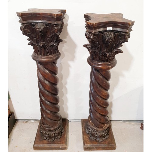 285 - A pair of carved wooden Corinthian columns, one A/F, height 150cm. No shipping. Arrange collection o... 