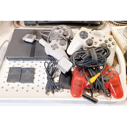 296 - A mini Playstation 2 with controllers and memory cards. UK shipping £14. Electricals are sold as scr... 