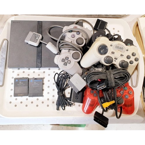 296 - A mini Playstation 2 with controllers and memory cards. UK shipping £14. Electricals are sold as scr... 