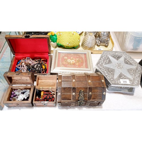 299 - Six jewellery boxes and contents. UK shipping £14.