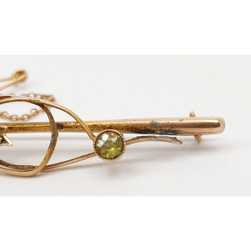 2 - A 9ct gold bar brooch set with peridot and seed pearls, A/F, length 5cm, gross weight 2.5g. UK shipp... 