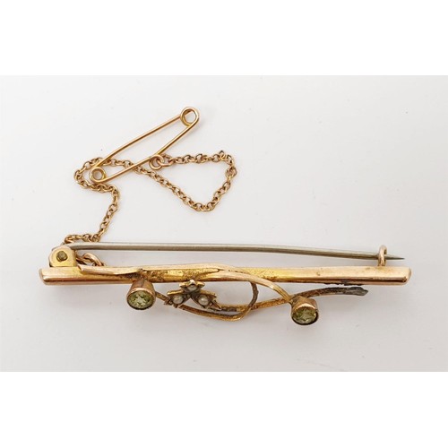 2 - A 9ct gold bar brooch set with peridot and seed pearls, A/F, length 5cm, gross weight 2.5g. UK shipp... 