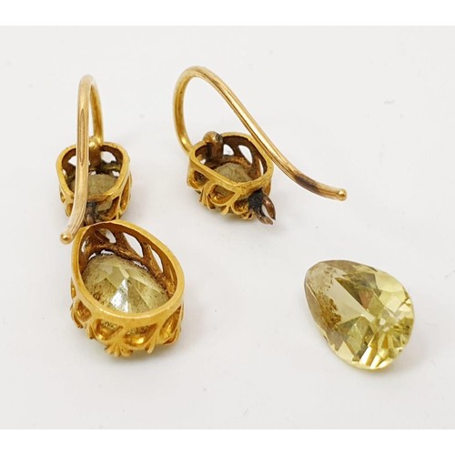 6 - A pair of scrap yellow metal earrings set with peridot, gross weight 2.2g. UK shipping £14.