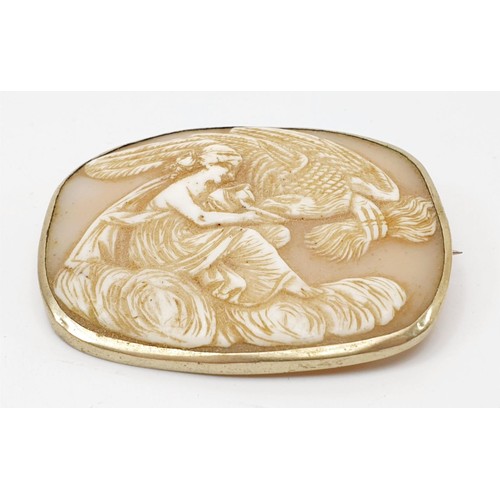 12 - An antique shell cameo brooch depicting a mythological scene of Hebe offering ambrosia to Zeus in th... 