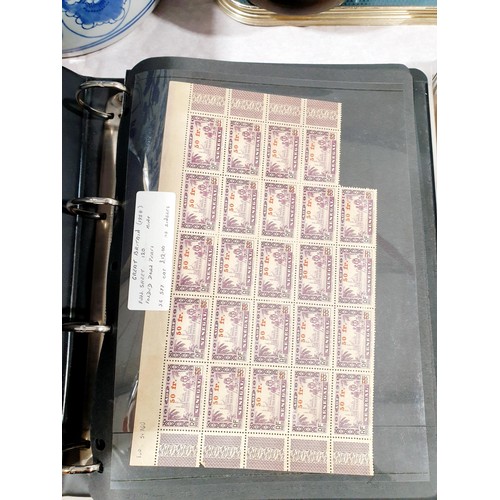 43 - An album of world stamps. UK shipping £14.