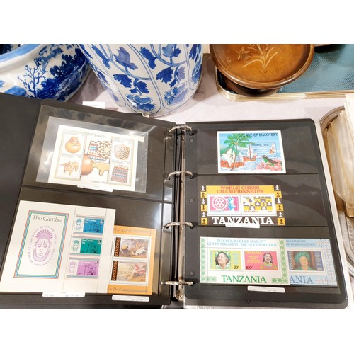 43 - An album of world stamps. UK shipping £14.