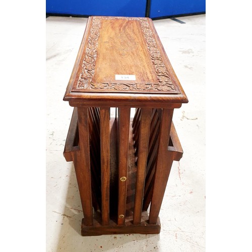 134 - A wooden carved and inlaid magazine rack/table, width 52cm. No shipping. Arrange collection or your ... 