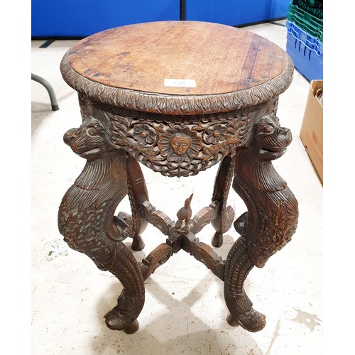 135 - A vintage wooden carved table, height 57cm. No shipping. Arrange collection or your own packer and s... 