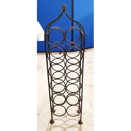 136 - A twelve bottle wrought iron wine rack, height 83.5cm. No shipping. Arrange collection or your own p... 