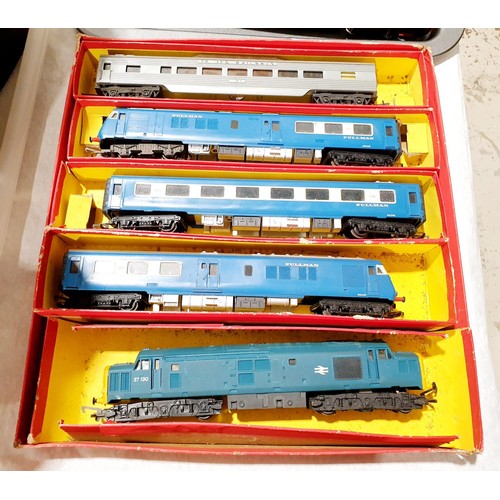 177 - A vintage boxed Tri-ang Hornby The Blue Pulman engine and two carriages together with a diesel elect... 