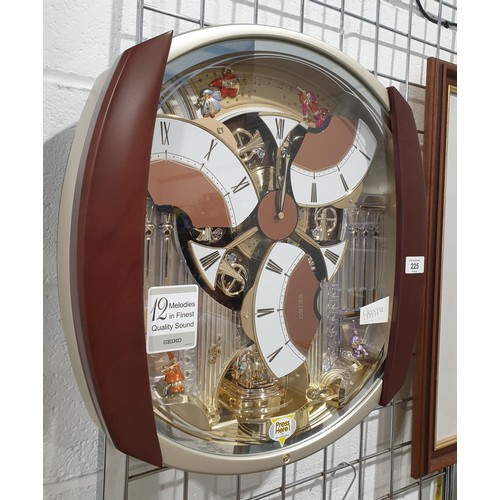 225 - A boxed Seiko QXM250B musical animated wall clock, length 47cm. No shipping. Arrange collection or y... 