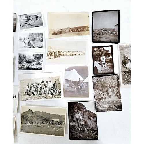 149 - A selection of vintage postcards and photographs including military. UK shipping £14.