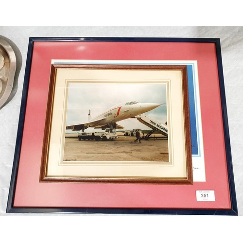 251 - A framed print of Concorde, the Red Arrows and the QE II liner, 28.5x35.5cm together with a photogra... 