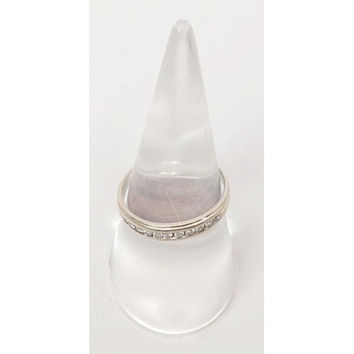 16 - A hallmarked 9ct white gold and diamond half eternity ring, .25ct of diamond, gross weight 2.1g, siz... 