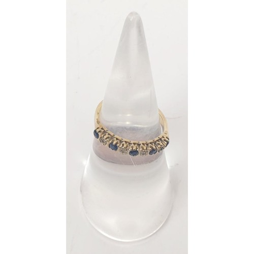 19 - A 9ct gold diamond and sapphire half eternity ring, gross weight 1.6g, size J. UK shipping £14.