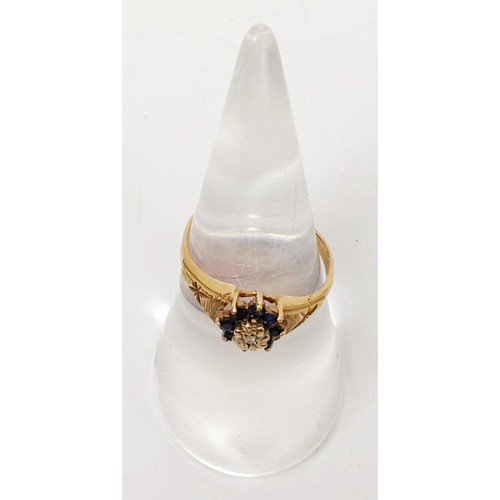 23 - A hallmarked 9ct gold diamond and sapphire cluster ring, gross weigh 1.5g, size N. UK shipping £14.