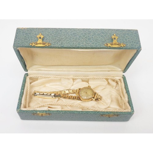 45 - A vintage ladies Tudor Royal cocktail wrist watch in a hallmarked 9ct gold case on a a gold plated b... 