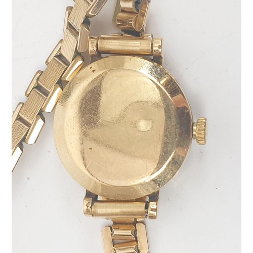 45 - A vintage ladies Tudor Royal cocktail wrist watch in a hallmarked 9ct gold case on a a gold plated b... 