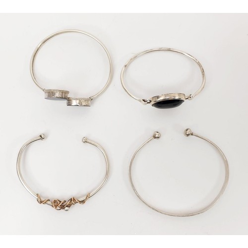 13 - Four silver bangles, gross weight 53g. UK shipping £14.