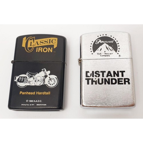 53 - A BMW Zippo lighter, a Varga Girl Zippo lighter, a Zippo 1 cent coin, Zippo ephemera and two other l... 