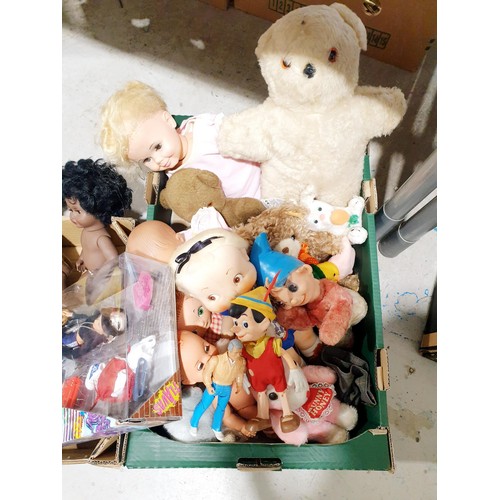 92 - Two boxes of vintage and later soft toys and dolls including an A-Team figure and a Harrod's bear. N... 