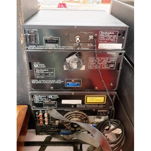109 - A Technics hi-fi comprising amplifier SU-CH7, tuner ST-CH7L. cassette deck RS-CH7, and CD player SL-... 