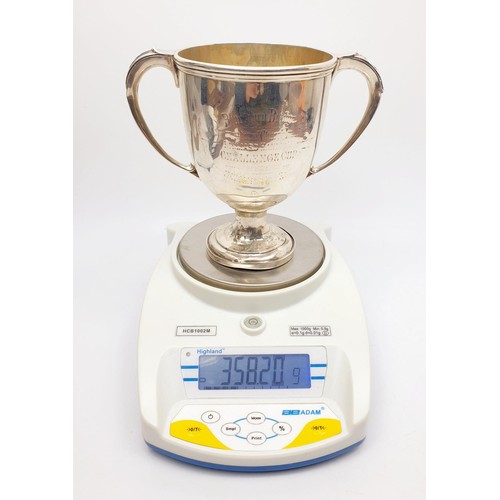 13 - A hallmarked silver twin handled trophy, A/F, height 152mm, gross weight 358g, hallmark rubbed. No i... 