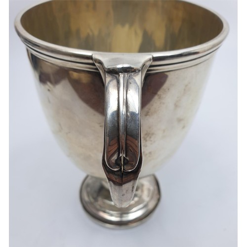 13 - A hallmarked silver twin handled trophy, A/F, height 152mm, gross weight 358g, hallmark rubbed. No i... 