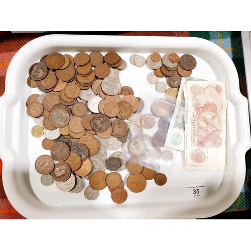 35 - British and foreign coins and bank notes including and 1945 two shilling coin. No international ship... 