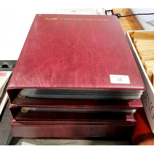 36 - Two folders of Royal Mail first day covers including The Beatles. No international shipping.