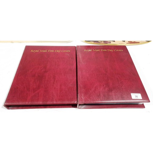 36 - Two folders of Royal Mail first day covers including The Beatles. No international shipping.