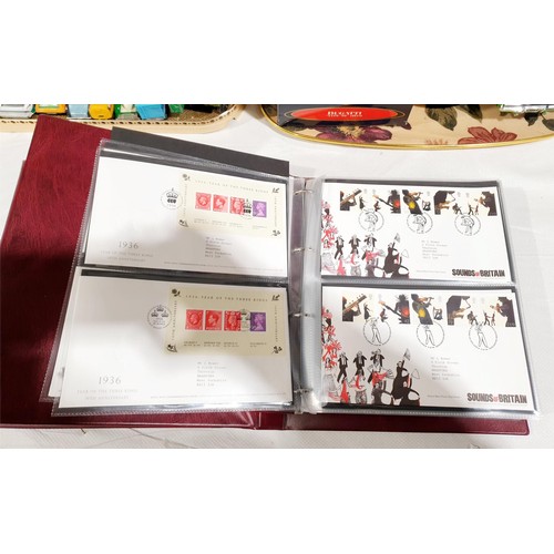 36 - Two folders of Royal Mail first day covers including The Beatles. No international shipping.