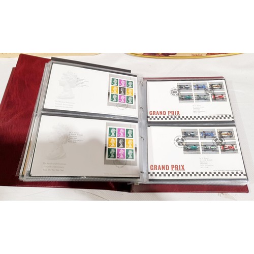 36 - Two folders of Royal Mail first day covers including The Beatles. No international shipping.