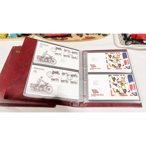 36 - Two folders of Royal Mail first day covers including The Beatles. No international shipping.