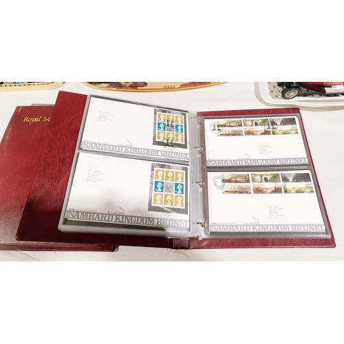 36 - Two folders of Royal Mail first day covers including The Beatles. No international shipping.