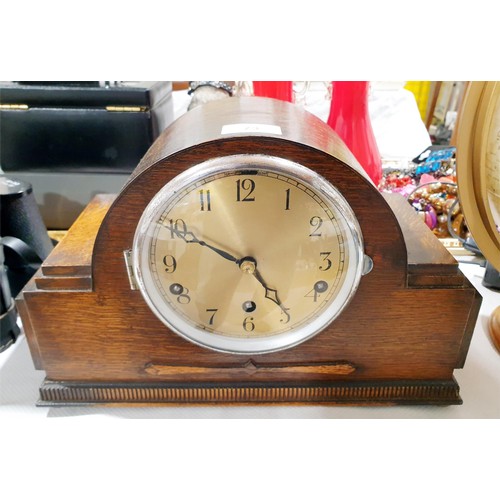 73 - An oak Art Deco mantel clock, width 34.5cm. No shipping. Arrange collection or your own packer and s... 