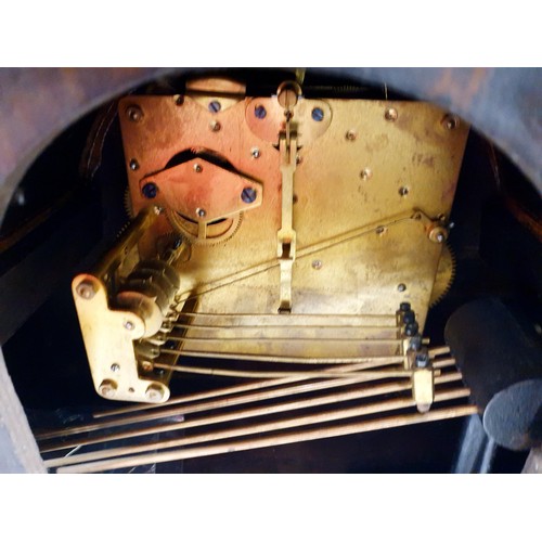 73 - An oak Art Deco mantel clock, width 34.5cm. No shipping. Arrange collection or your own packer and s... 